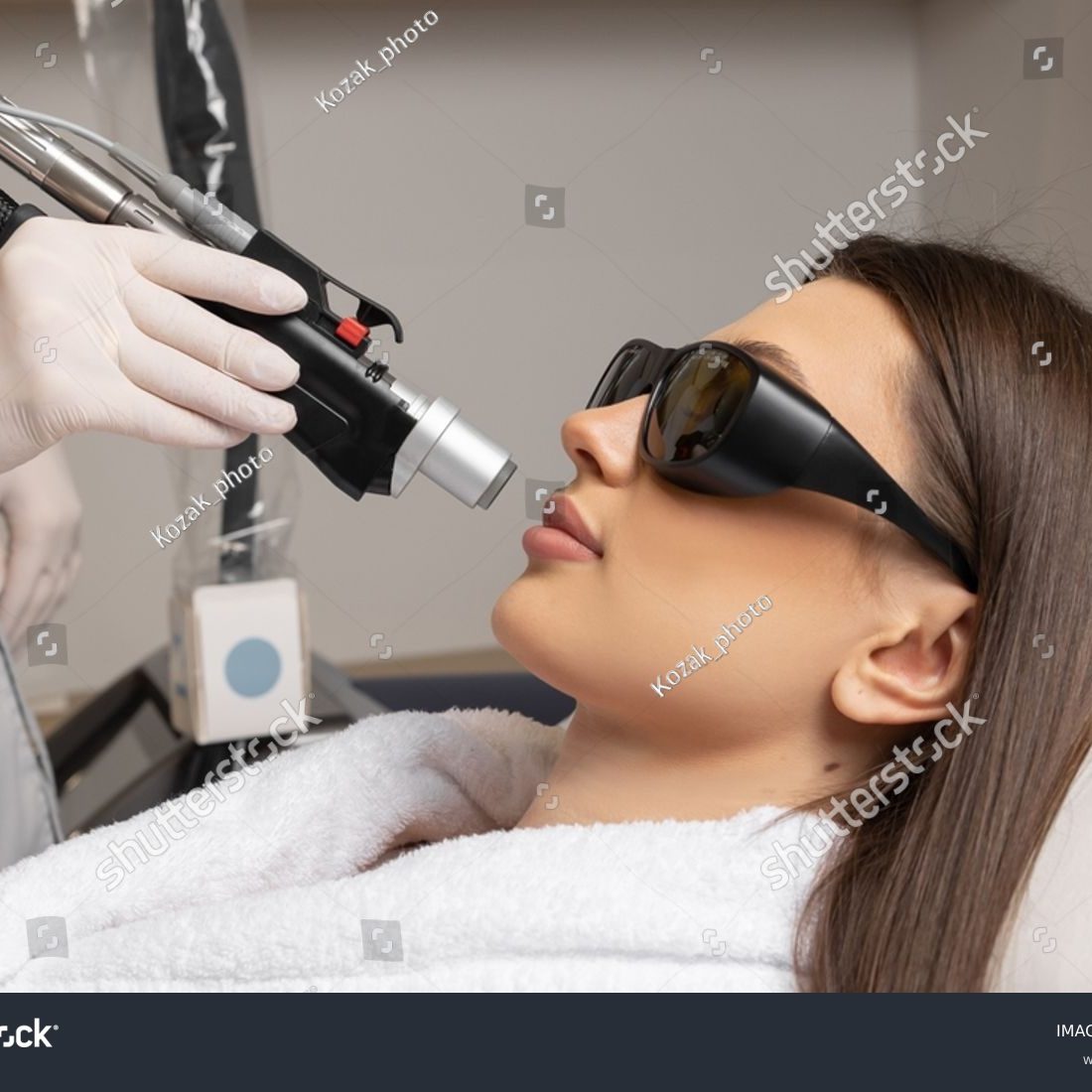 stock-photo-cosmetologist-make-laser-hair-removal-on-woman-s-under-nose-2432552155