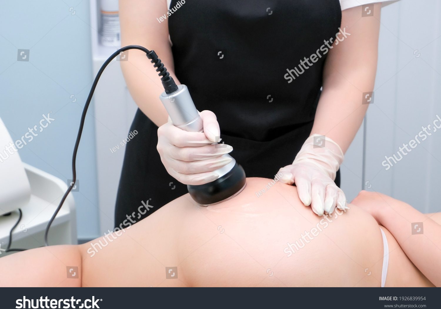 stock-photo-vacuum-massage-device-vacuum-massage-of-the-buttocks-and-legs-anti-cellulite-body-correction-1926839954